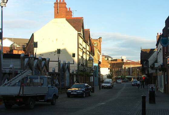 Spon Street today and during the 1900 floods.