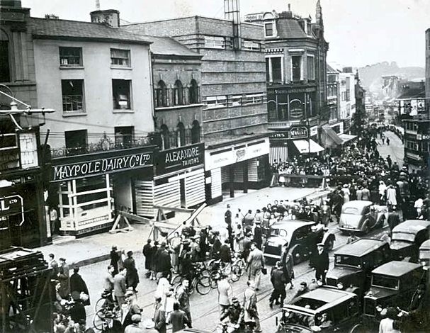 A crowd gathers to see the aftermath of the incident