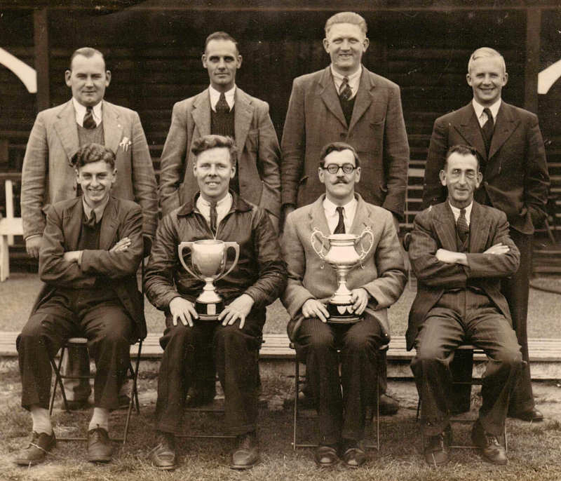 Group holding trophies