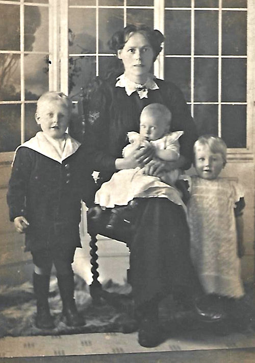 Lady with three children