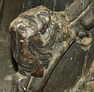 Ancient carving on the stalls inside the Old Grammar School 2005